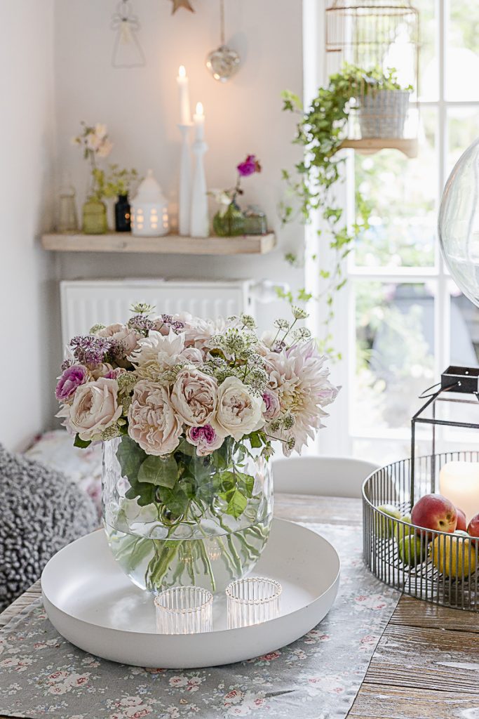 A summer bouquet  with cafe au lait dahlias and vintage roses