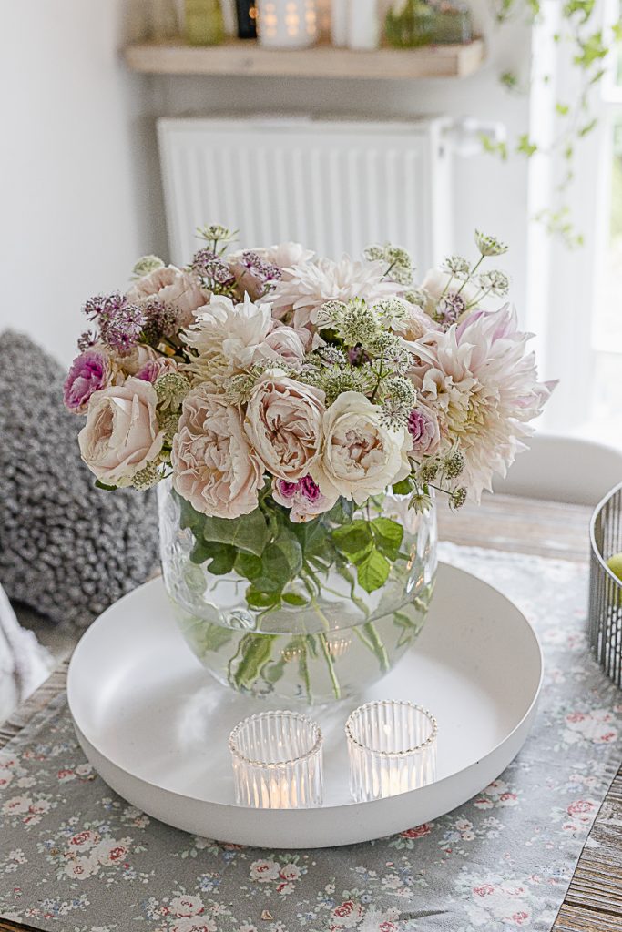 A summer bouquet  with cafe au lait dahlias and vintage roses